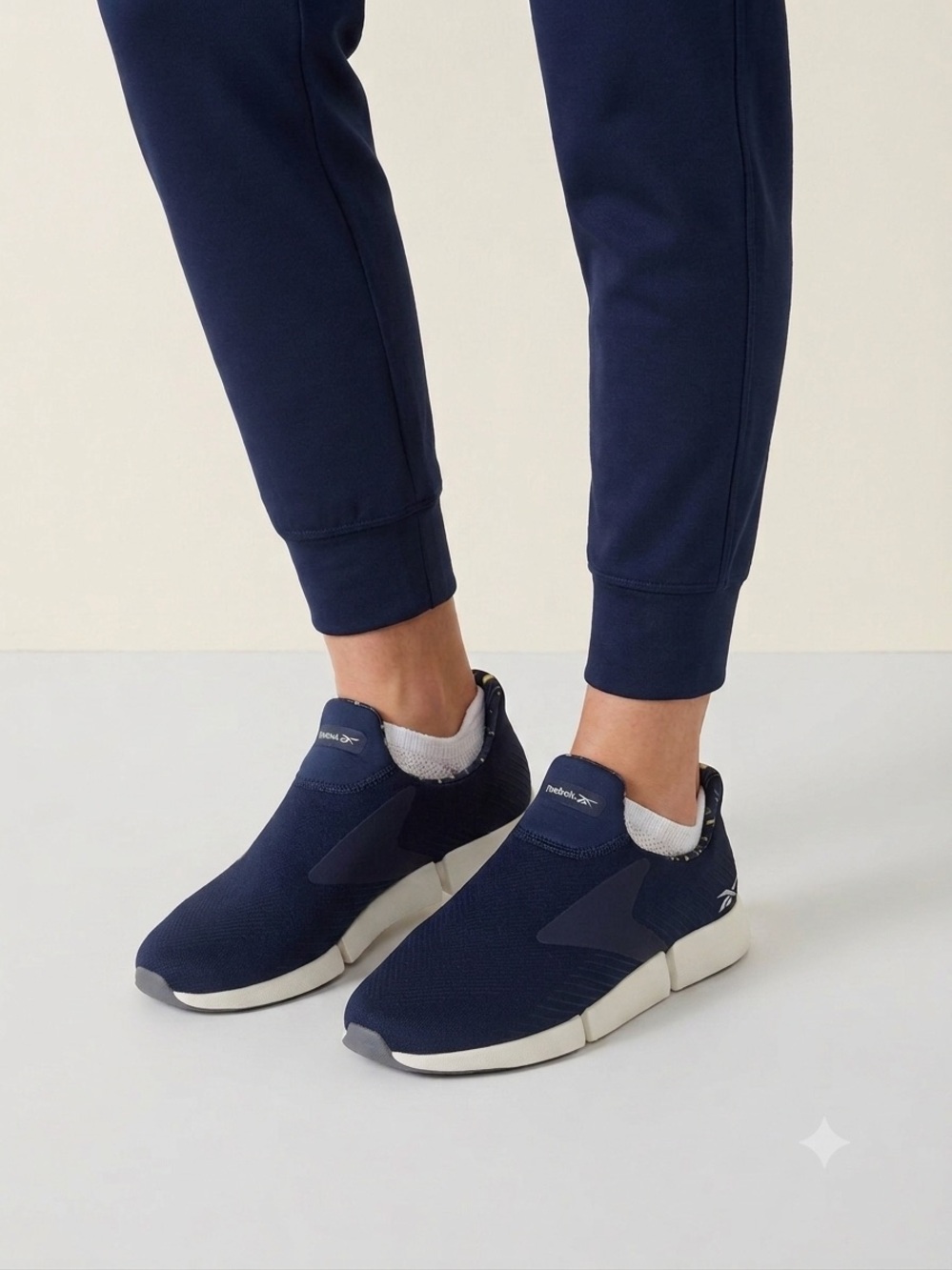 Reebok Woman’s Navy Slip-On Athletic Sneakers. DMX Moving Air